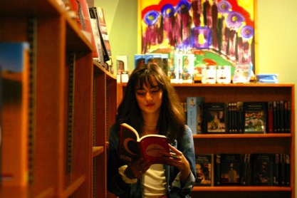 a girl reads a book