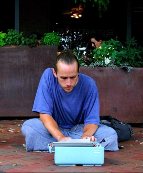 a man uses a type-writer